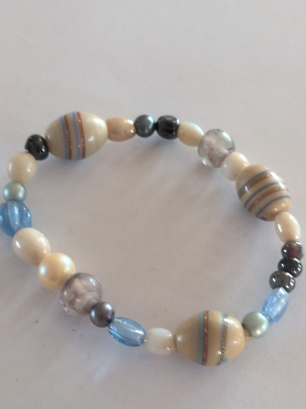 Handcrafted Blue and Cream Beaded Stretch Bracelet